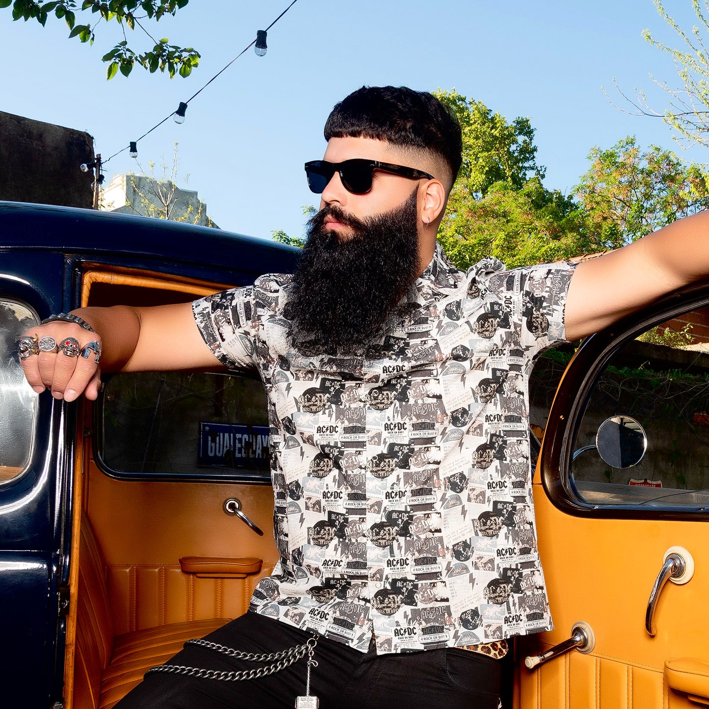 Man wearing a high-quality AC/DC Rock or Bust shirt. Not cheap merchandise, but quality. 