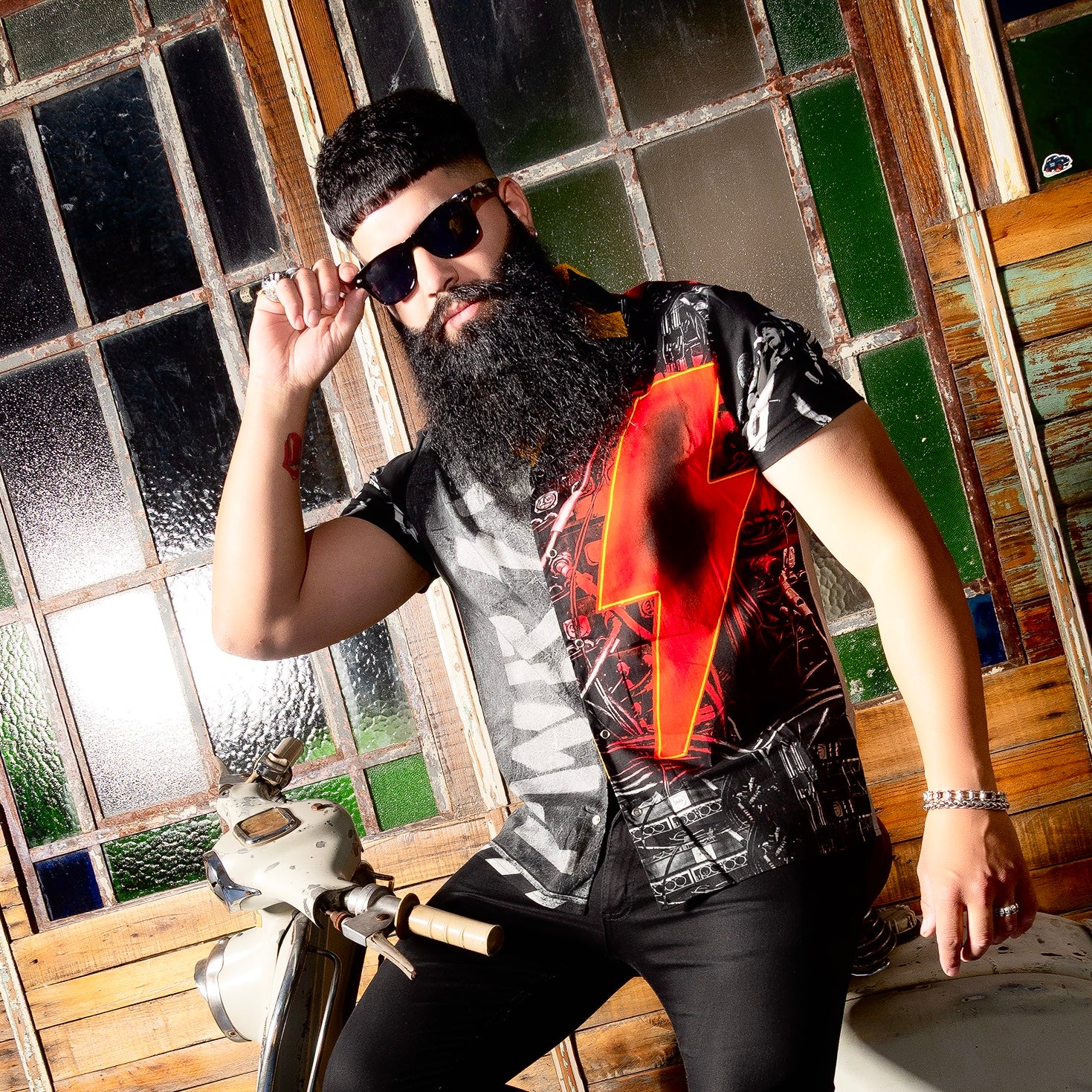 A rocker wears an AC/DC shirt. It has a PWR/UP style print. Not cheap merchandise, but high quality. 