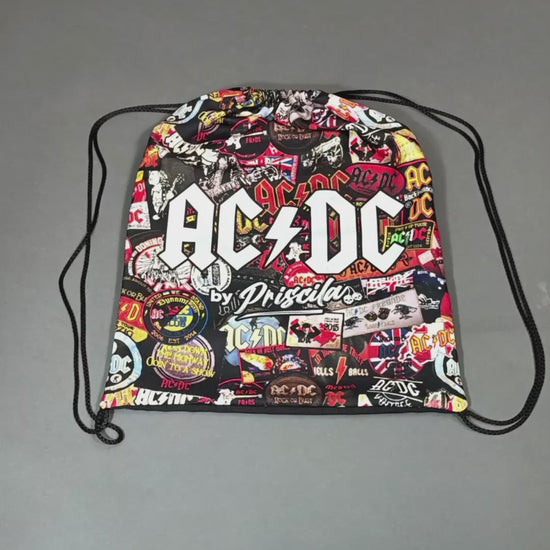 Unboxing video of a high-quality shirt from AC/DC. It is printed with many AC/DC patches. Not cheap merchandise, but high quality. 