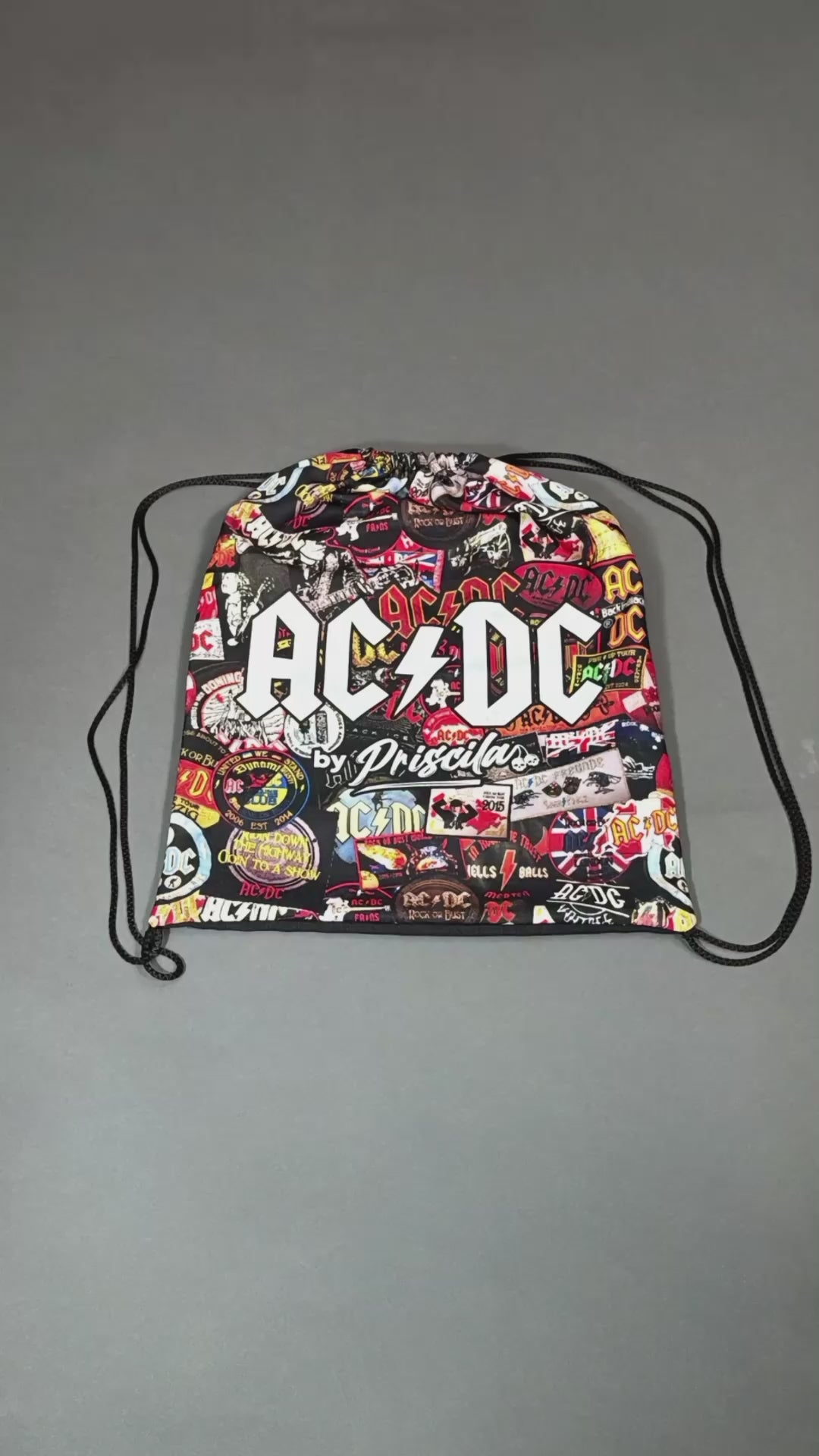 Unboxing video of a high-quality shirt from AC/DC. It is printed with many AC/DC patches. Not cheap merchandise, but high quality. 