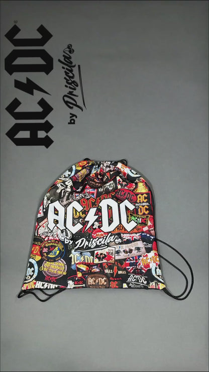 Unboxing video of a high-quality crop top from AC/DC. It is printed with lots of AC/DC patches. Not cheap merchandise, but high quality. 