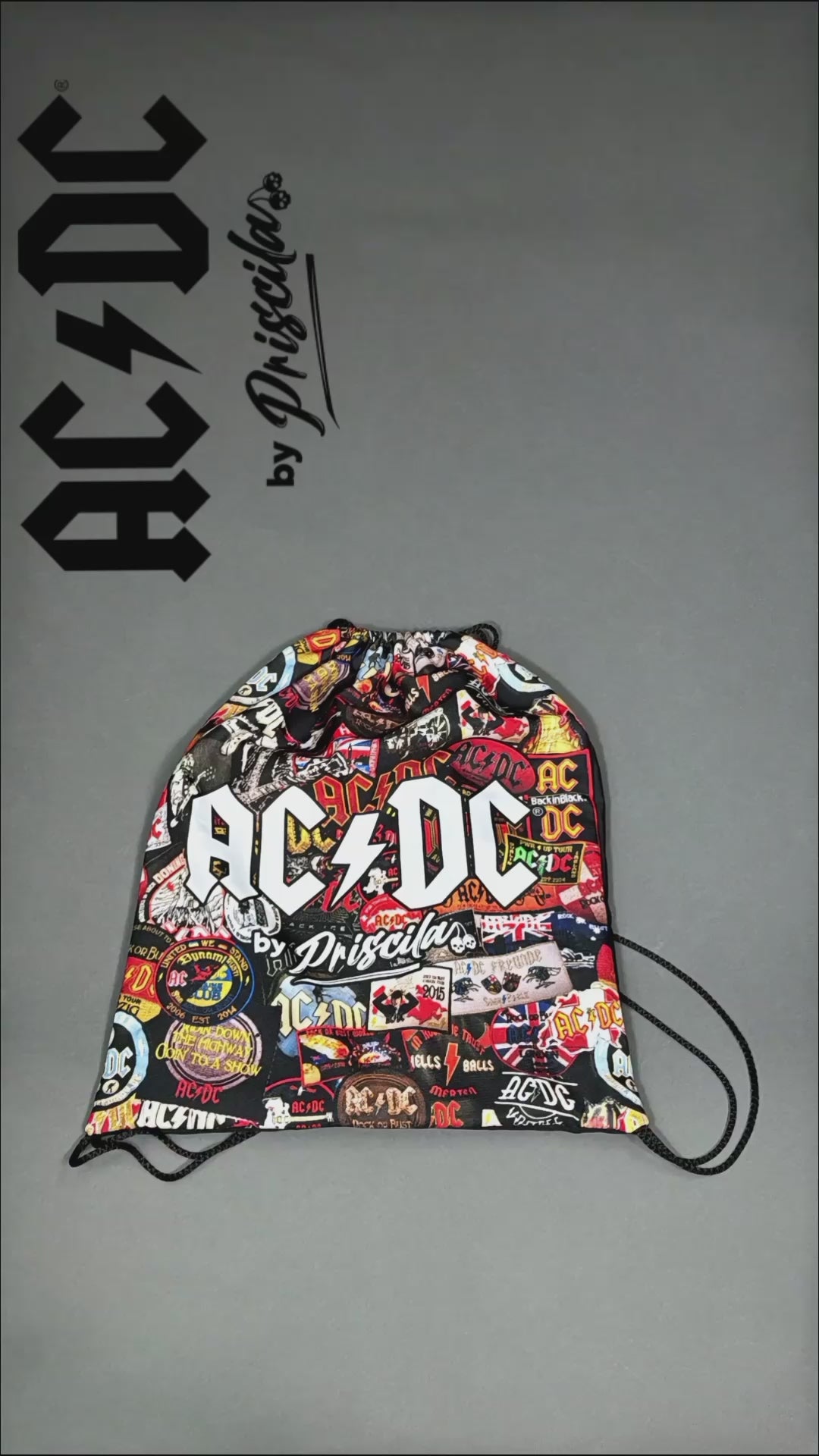Unboxing video of a high-quality crop top from AC/DC. It is printed with lots of AC/DC patches. Not cheap merchandise, but high quality. 