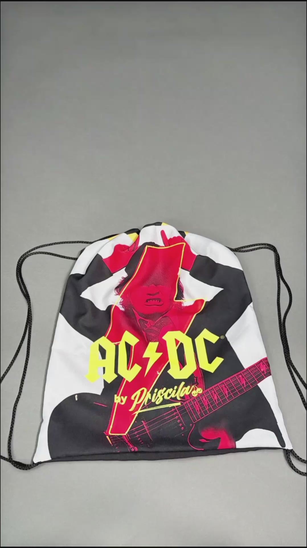 Unboxing video of a high-quality crop top from AC/DC. It features a PWR/UP style print. Not cheap merchandise, but high quality. 